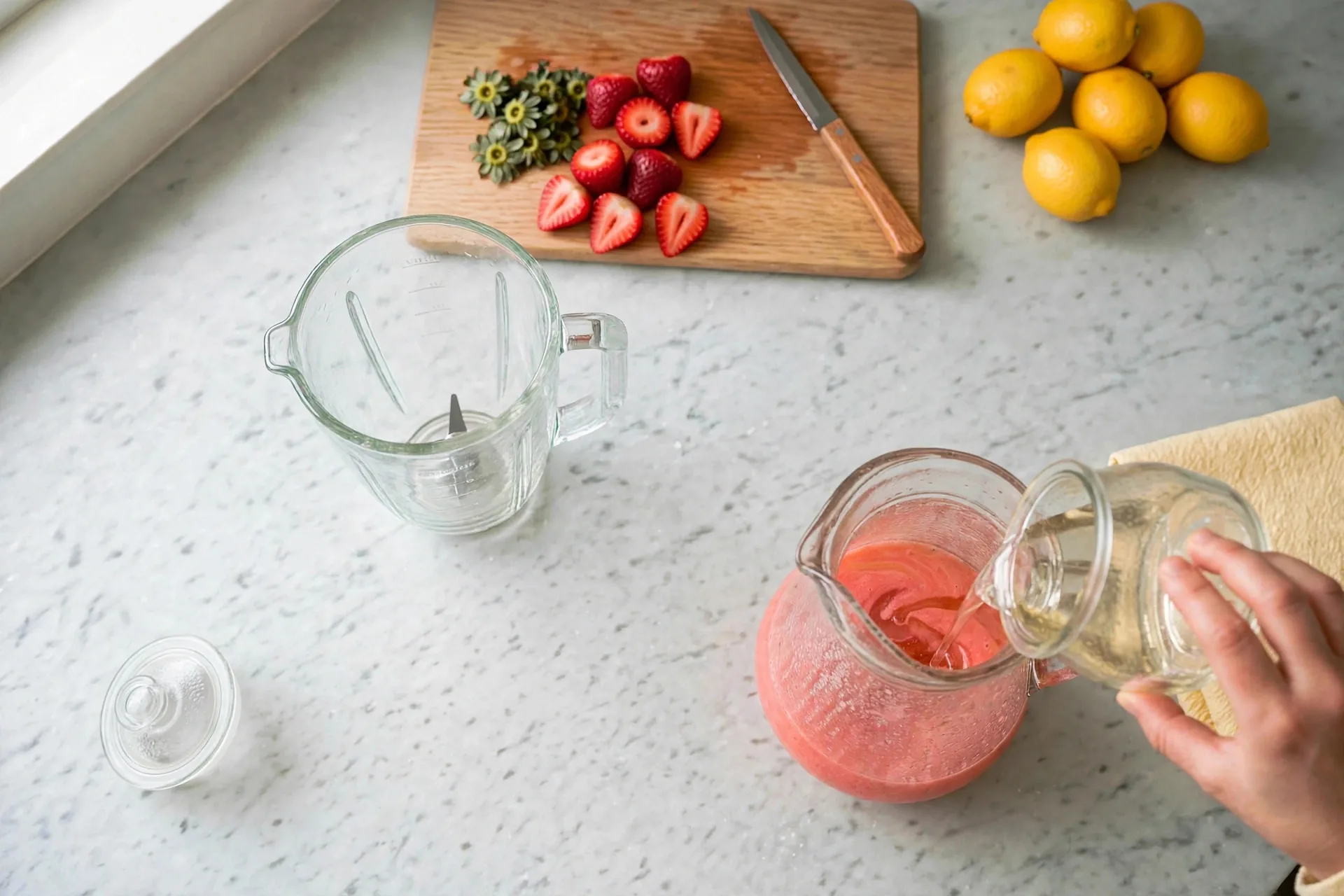 Clear simple syrup poured in a thin stream into the pitcher